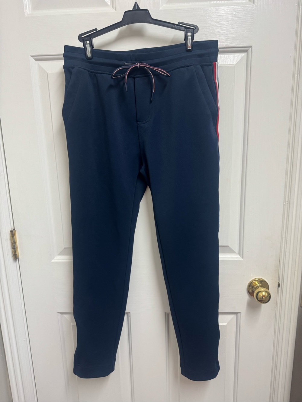 Women’s Tommy Hilfiger Navy drawstring Joggers Red & White Trim. Size small